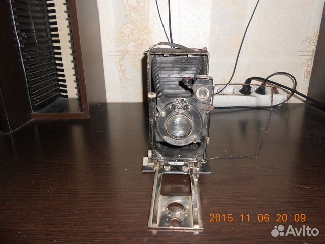 Старинный фотоаппарат Старинный фотоаппарат