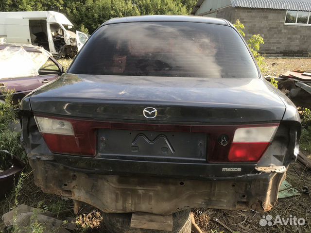 Крышка багажника (Mazda 323) Крышка багажника (Mazda 323)