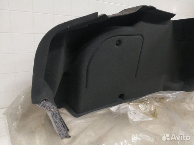Обивка багажника задняя левая Opel Astra H седан