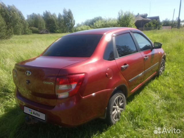 Гранта авито махачкала. Рено Логан 2012 красный. Рено Логан 2012 бордовый. Renault Logan 2012 красный темный. Renault Logan 2012 красный Luxe.