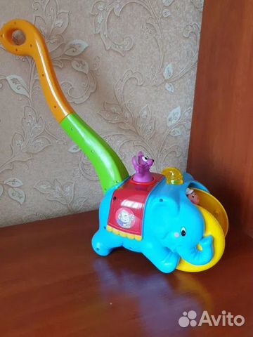 Детская игрушка - каталка 