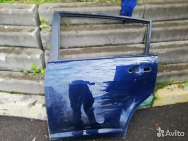 Nissan tiida дверь