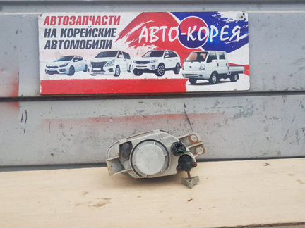 Фонарь противотуманный передний левый Ssang Yong
