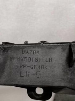Кронштейн фары левый Мазда 3 BK Z6 2008
