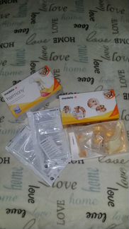 Молокоотсос medela harmony + пакеты для хранения м