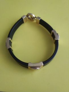 Каучуковый браслет с вставками из белого золота. Н