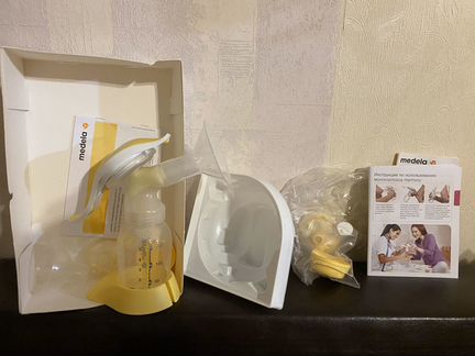 Молокоотсос ручной фирма Medela